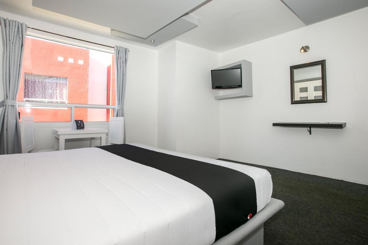 Capital O Euro Confort Hotel